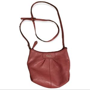 Coach leather crossbody. Berry color. Excellent condition. Clean inside.